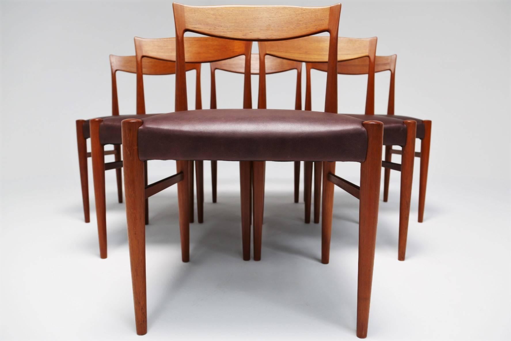 This rarely found set of vintage Danish dining chairs were made by Soro Stolefabrik in the 1960s. Crafted from solid teak which has a great tone and good clear grain throughout. Their design is typical of the Danish modern style in that they are