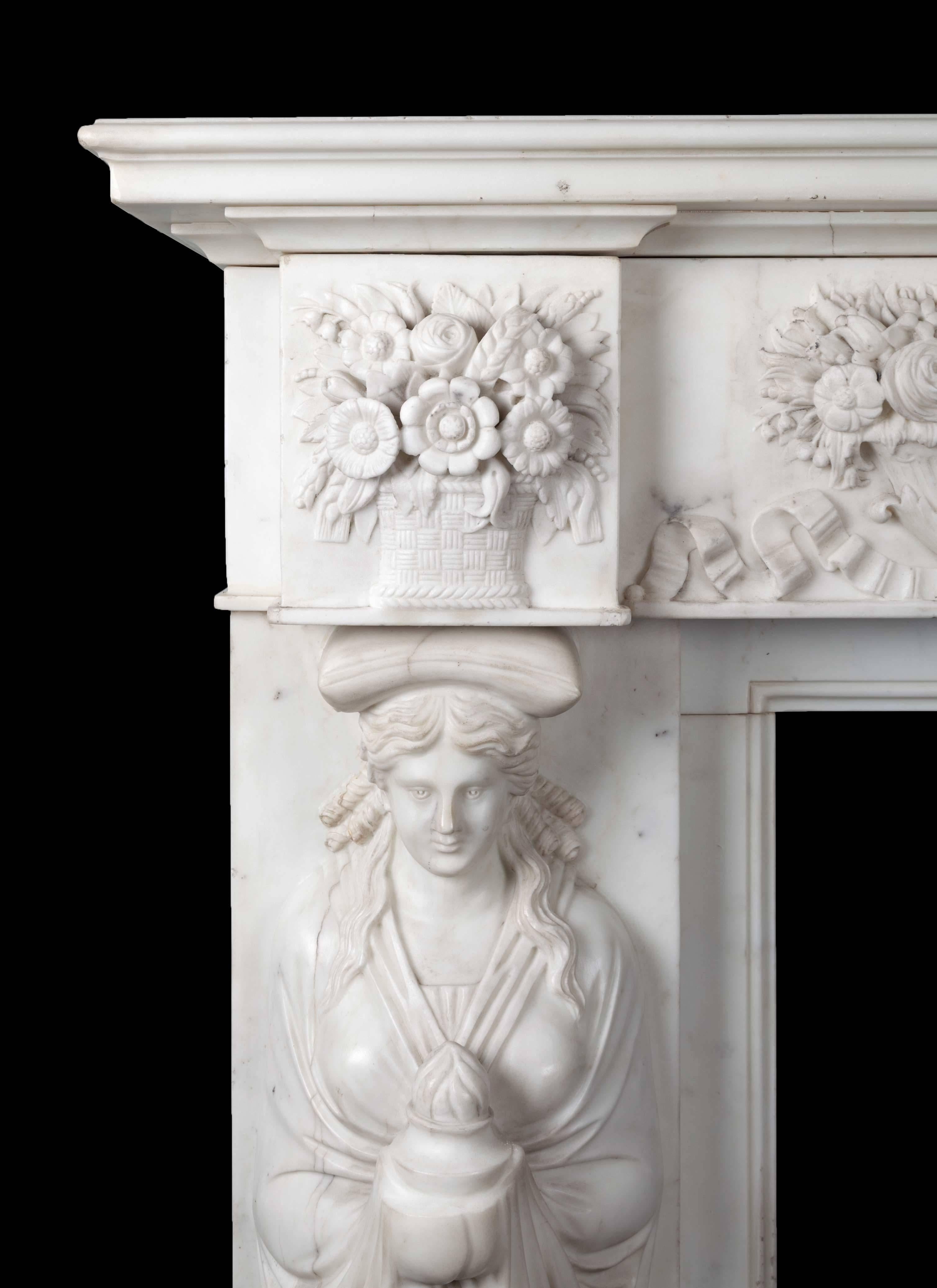 An outstanding and beautifully carved antique white statuary marble fireplace. The deep rectangular moulded shelf, rests on a frieze exquisitely carved with two pairs of cornucopias, centred by a classical scene. Each jamb has a full length