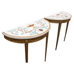 A pair of 18th century giltwood tables with Bossi marble tops