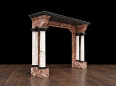 A large antique 19th century Renaissance revival marble fireplace surround