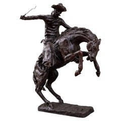 Bronze sculpture after Frederic Remington’s celebrated ‘The Bronco Buster’.
