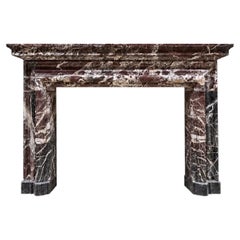 18th-century Italian fireplace mantel in Rosso Levanto marble