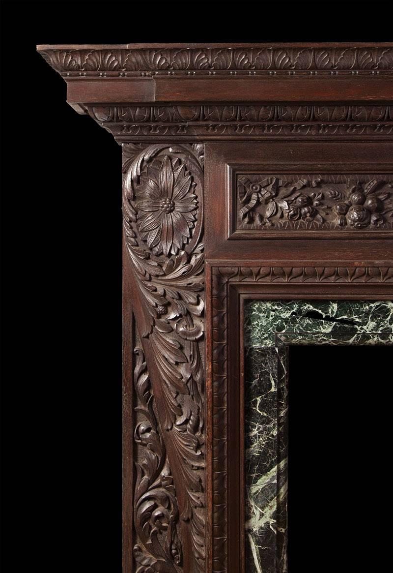 Renaissance Revival English Antique Carved Teak Fireplace