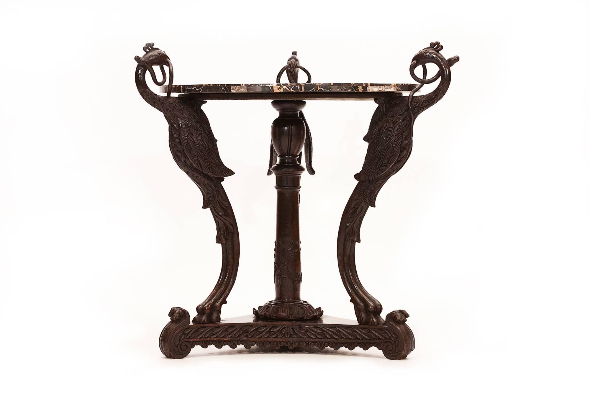 An early 19th century specimen marble topped table, with exceptionally fine Padauk wooded base
The top beautifully inlaid with specimens of rare and semi-precious marbles such as Nero Portoro, Giallo Antico, Sienna, Rossa Verona, Verde Antico,