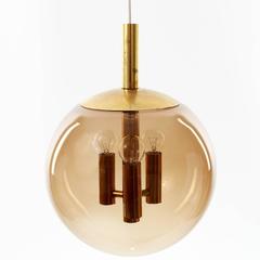 Limburg Pendant Light Brass and Amber Tone Glass Globe, 1960s