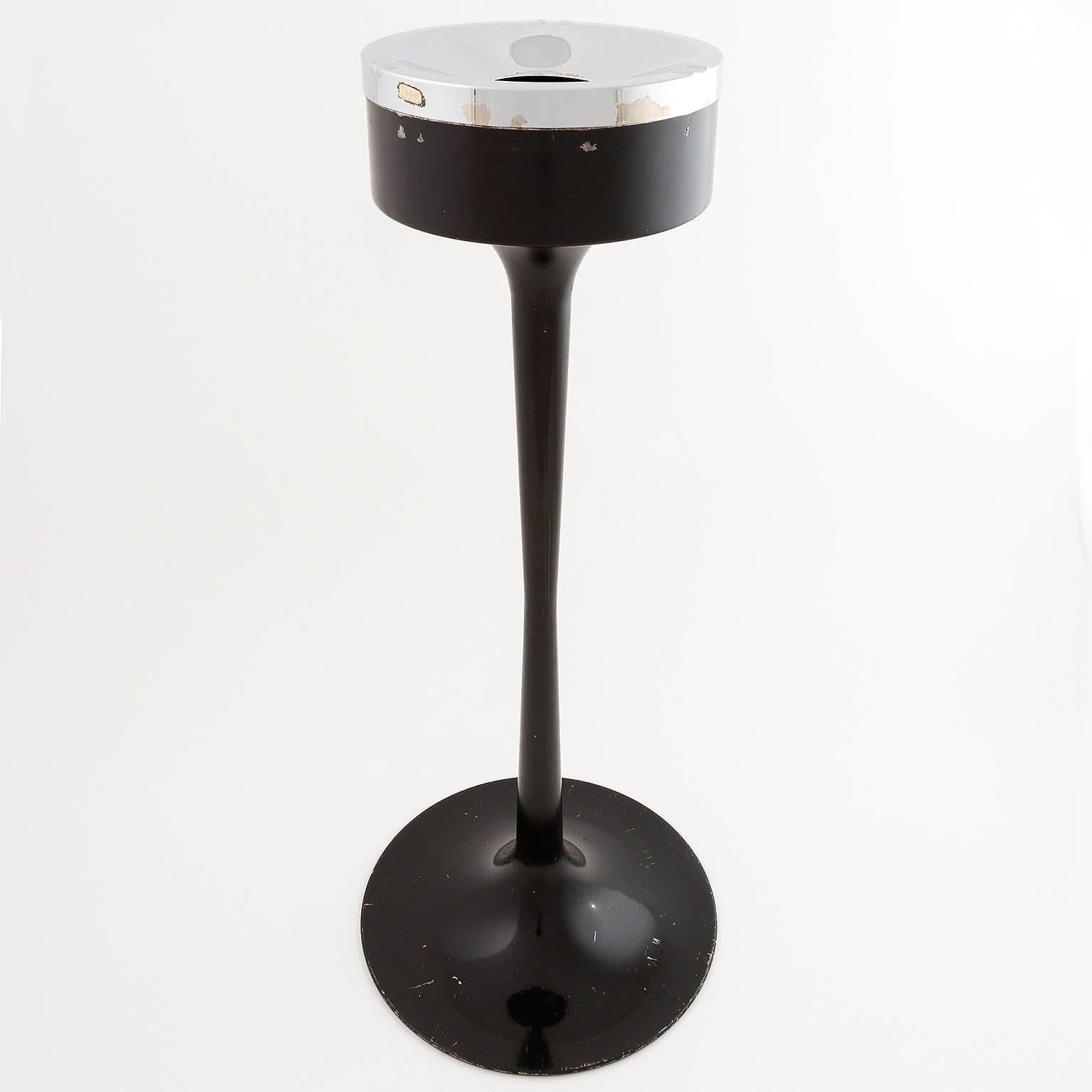 An ashtray with tulip base by Fase Madrid, Spain. Made of chrome and black lacquered metal. Wear on chrome and lacquer. Label is still available.