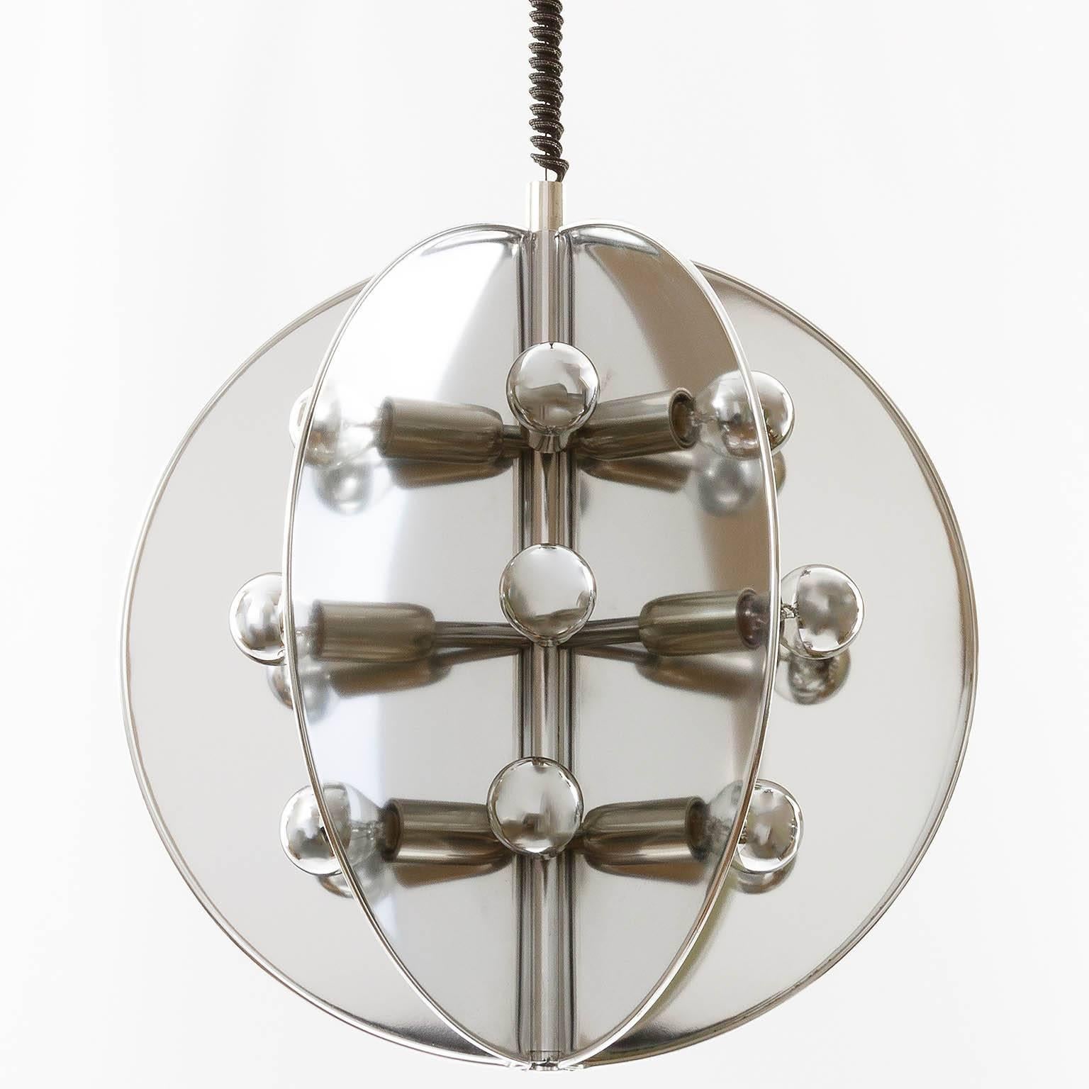 A height adjustable Sputnik or atomium chandelier from Italy. 18 small base bulbs. Works well with half chrome or clear bulbs.

Reduced from $2300.