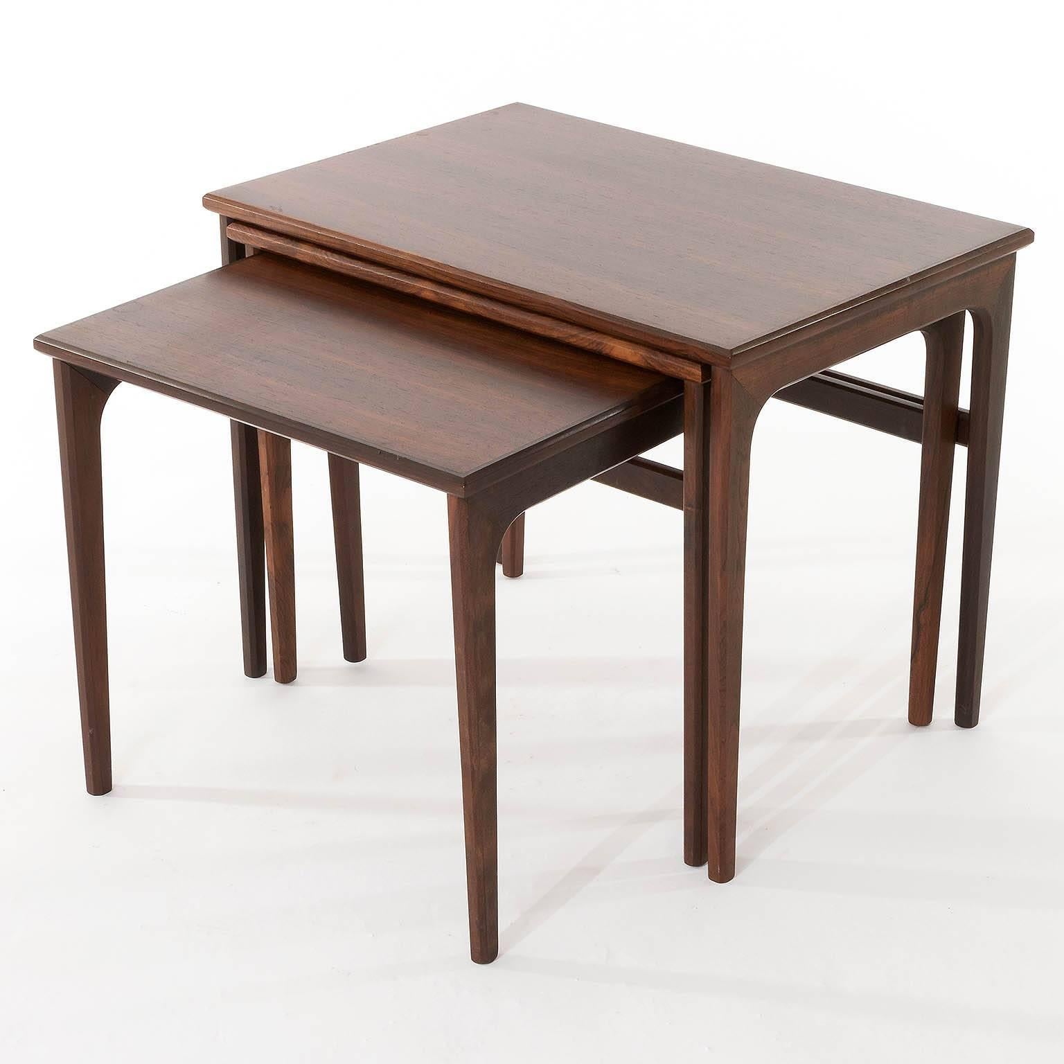 A set of three Danish / Scandinavian Modern nesting tables made of rosewood or palisander, manufactured in Mid-Century, circa 1960.
Please note: furtniture made of rosewood can not be shipped to the US.
   