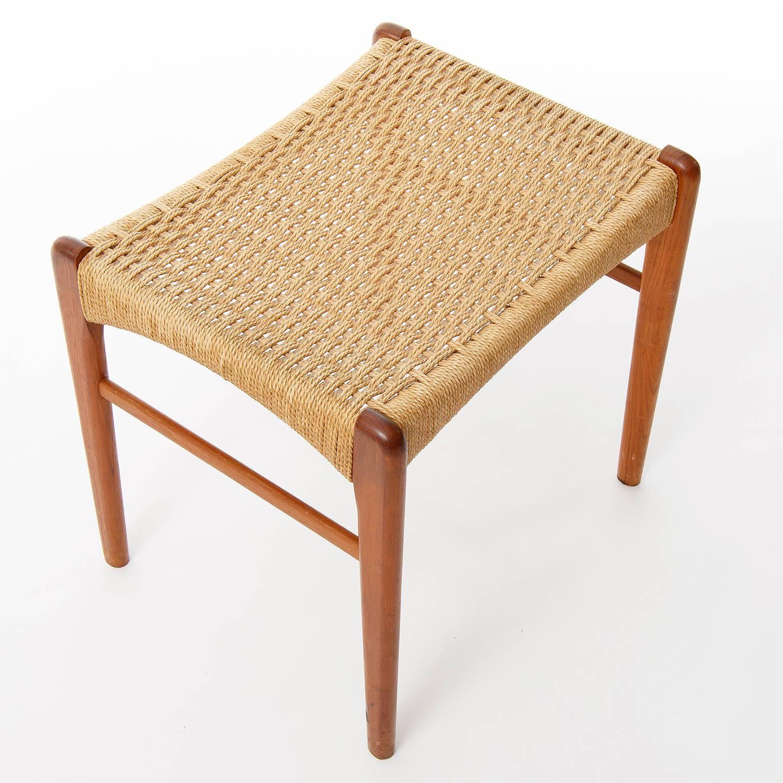 A Danish Scandinavian Modern stool made of teak and paper cord. Excellent original condition.