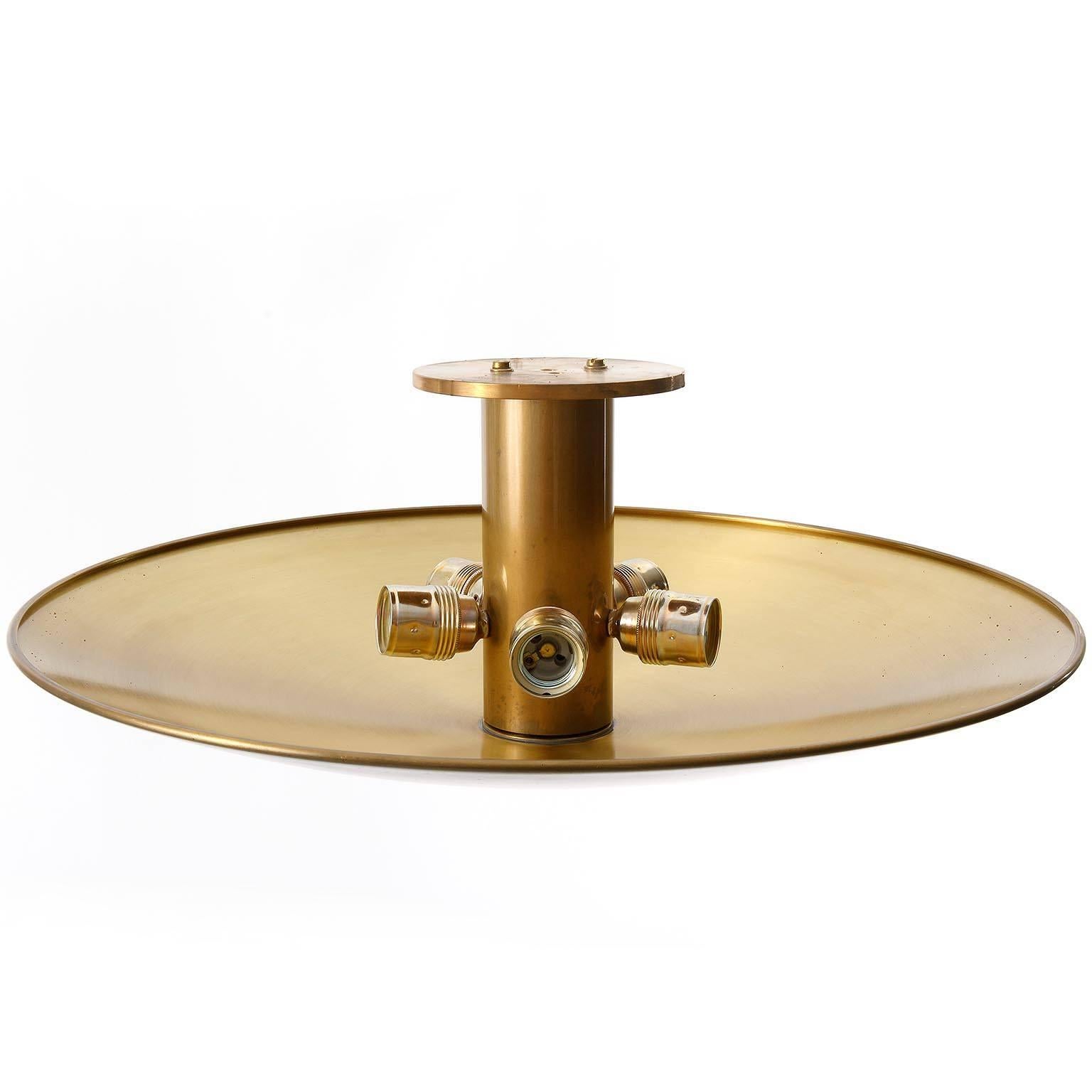 A large uplight bowl ceiling light fixture by Florian Schulz, Germany, manufactured in Mid-Century, circa 1970 (late 1960s-1970s). The lamp is made of patinated solid brass in a tarnished finish. It takes five medium Edison base bulbs.