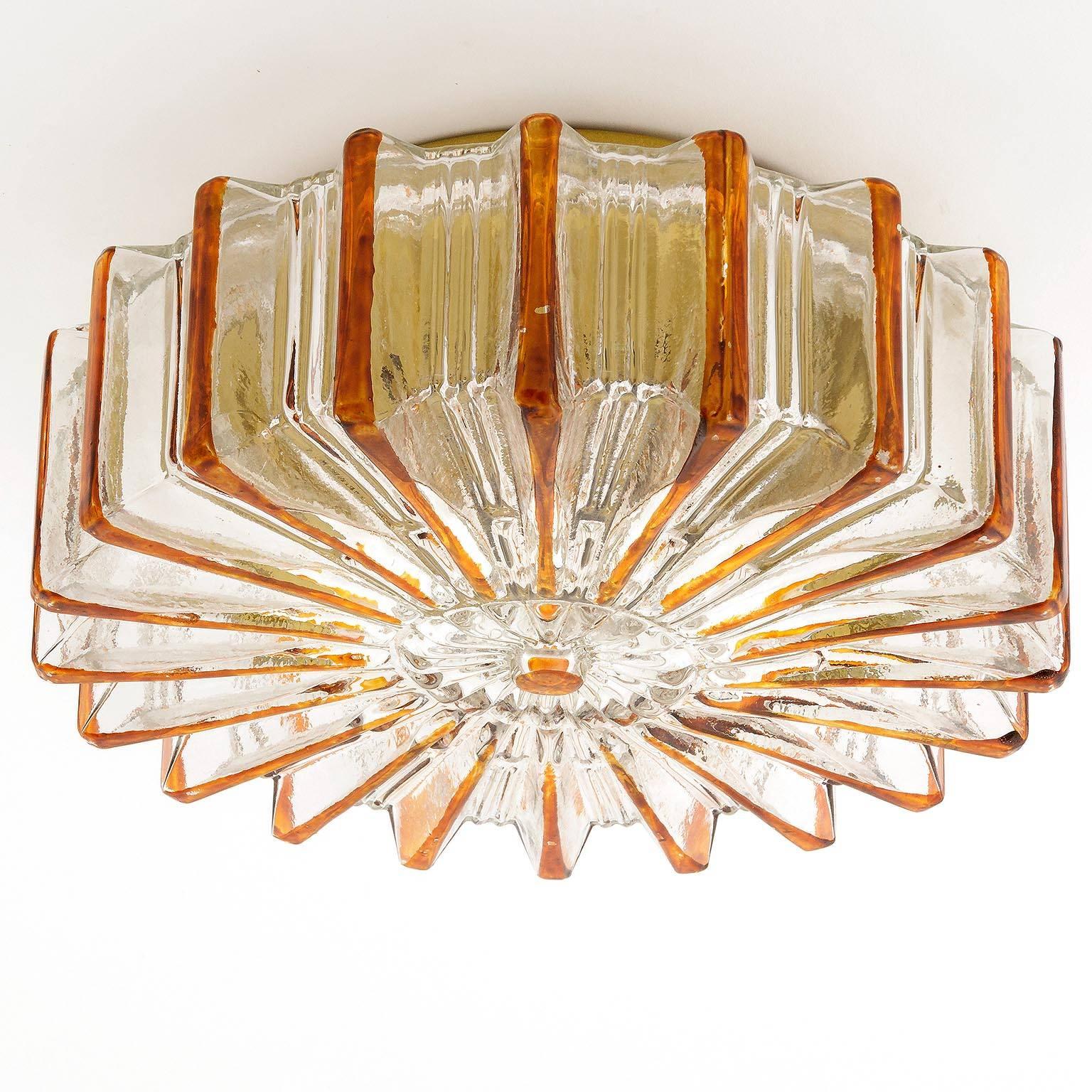 German Pair of Amber Tone Sunburst Glass Sconces or Flush Mount Light Fixtures, 1960s