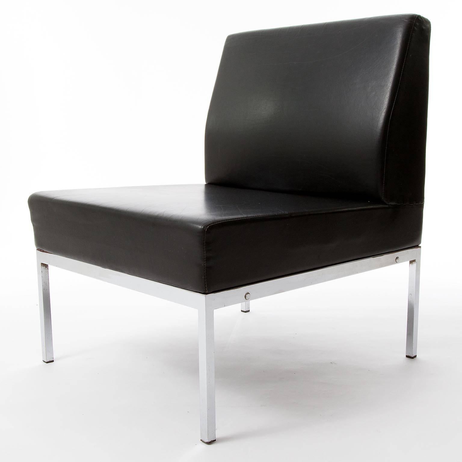 A set of two leather and chrome or nickel lounge chairs attributed to Thonet, Austria, circa 1970 (late 1960s or early 1970s).
They are made of a high quality and thick black leather on a chromed (or nickeled) metal frame.
The chairs can be mounted