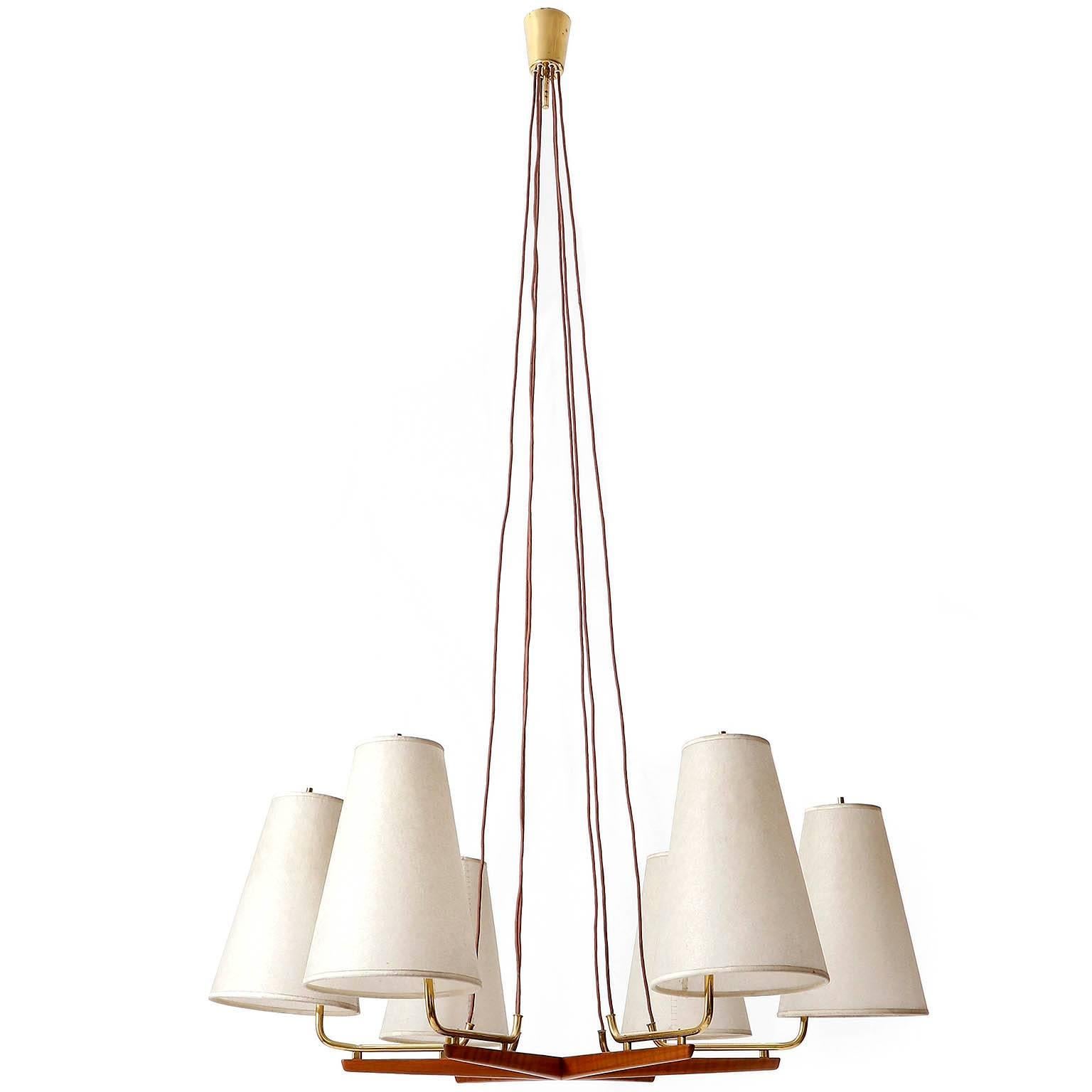 A large pendant lamp model no. 3652/6 'Holzstern' (engl. wood star) by J.T. Kalmar, Austria, manufactured in Mid-Century, circa 1960. 
This light was produced in 1950s as well as in 1960s and it is documented in the Kalmar catalogues from both