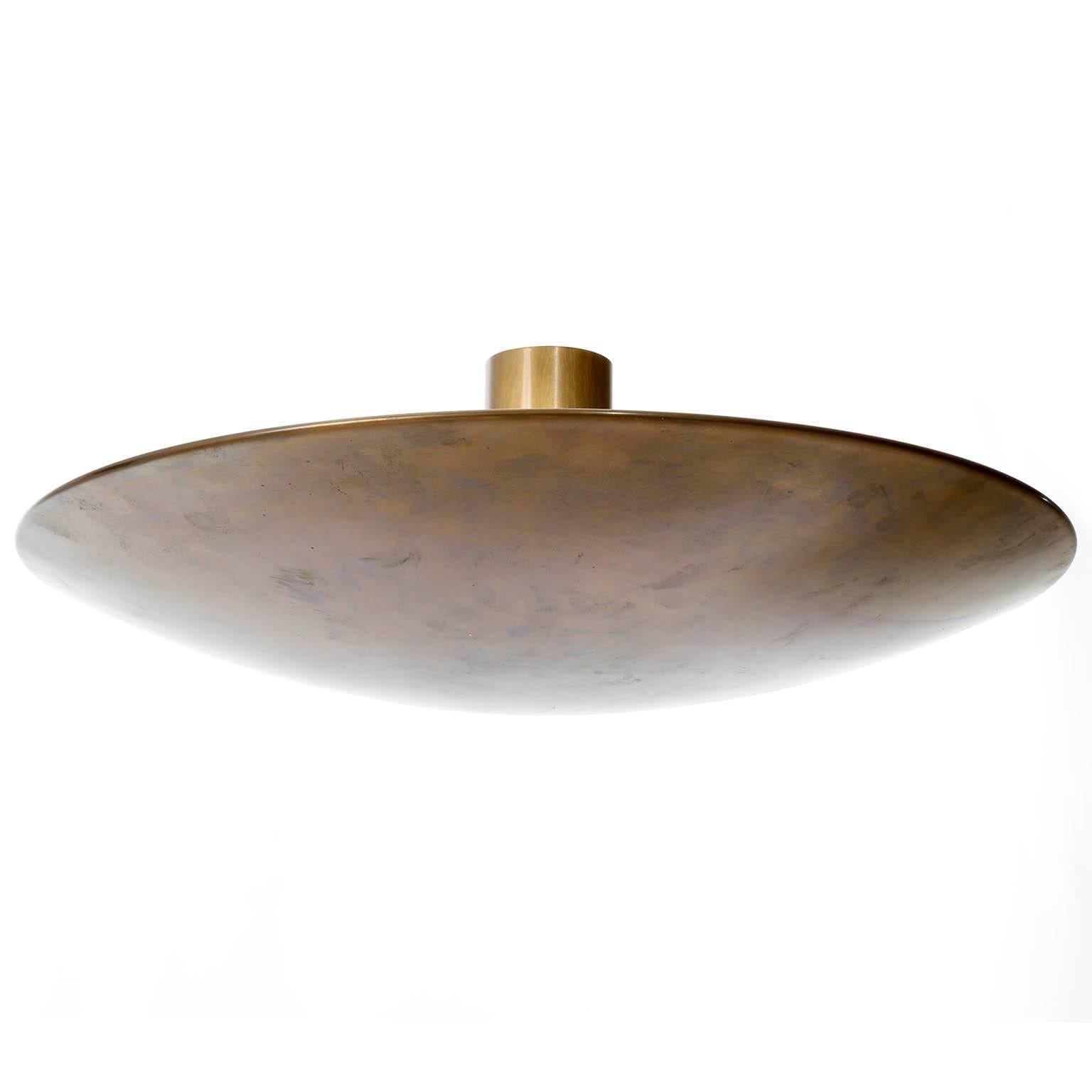 A large uplight bowl ceiling light fixture by Florian Schulz, Germany, manufactured in midcentury, circa 1970 (late 1960s or early 1970s). 
This uplighter is made of solid brass with great patina.
The lamp has five sockets for medium or standard