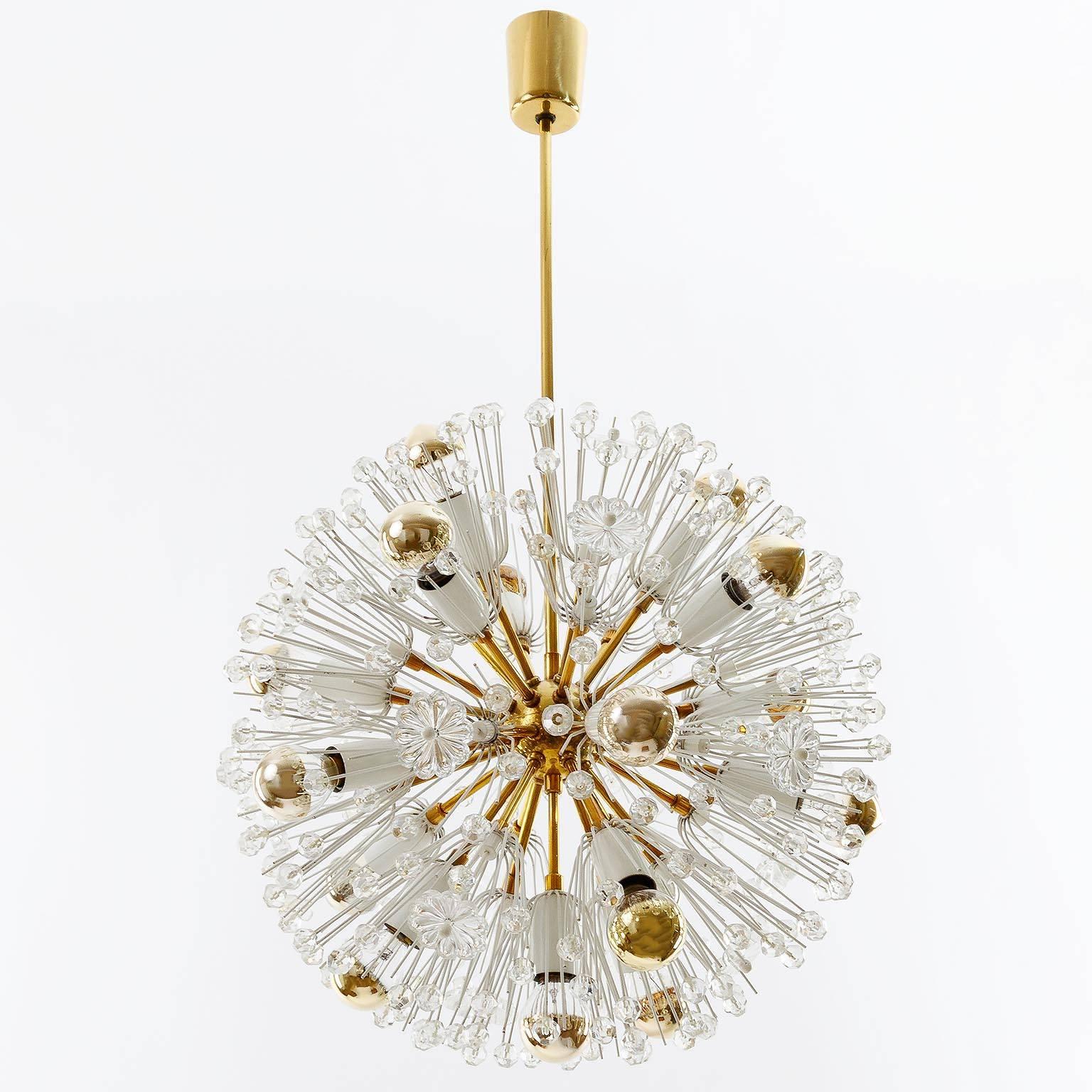 One of two outstanding 1950s Viennese Sputnik / blowball / snowball chandeliers / pendant lights by Emil Stejnar for Rupert Nikoll, Vienna, Austria. Original pieces manufactured in Mid-Century, circa 1950.
The lamps are are made of brass, white