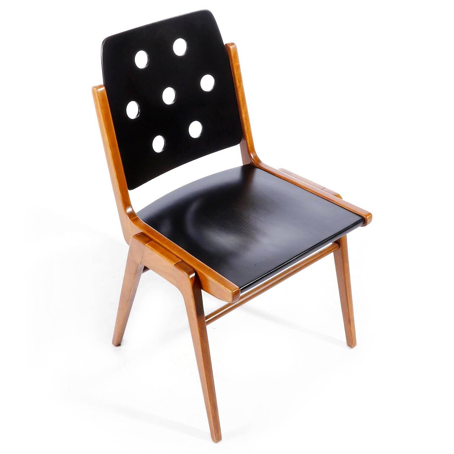 One of twelve bicolored stacking chairs designed by Austrian architect Franz Schuster manufactured by Wiesner-Hager in midcentury, circa 1960 (late 1950s or early 1960s).
This chair was designed by Franz Schuster for the Stadtpark-Forum Graz in 1959