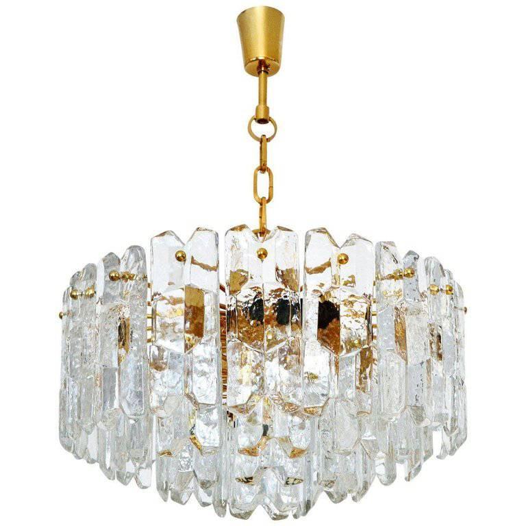 Currently only one light is available.

One of three very exquisit 24-carat gold-plated brass and clear brillant glass light fixtures by J.T. Kalmar, Vienna, Austria, manufactured in midcentury, circa 1970 (late 1960s and early 1970s).
The model