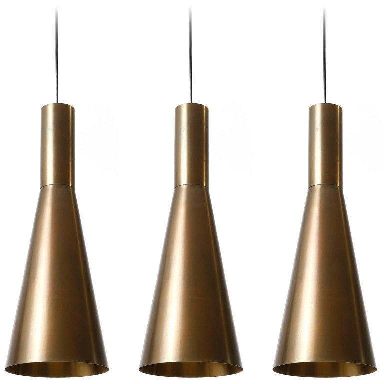 Set of Three Large Patinated Brass Pendant Lights, 1960s For Sale