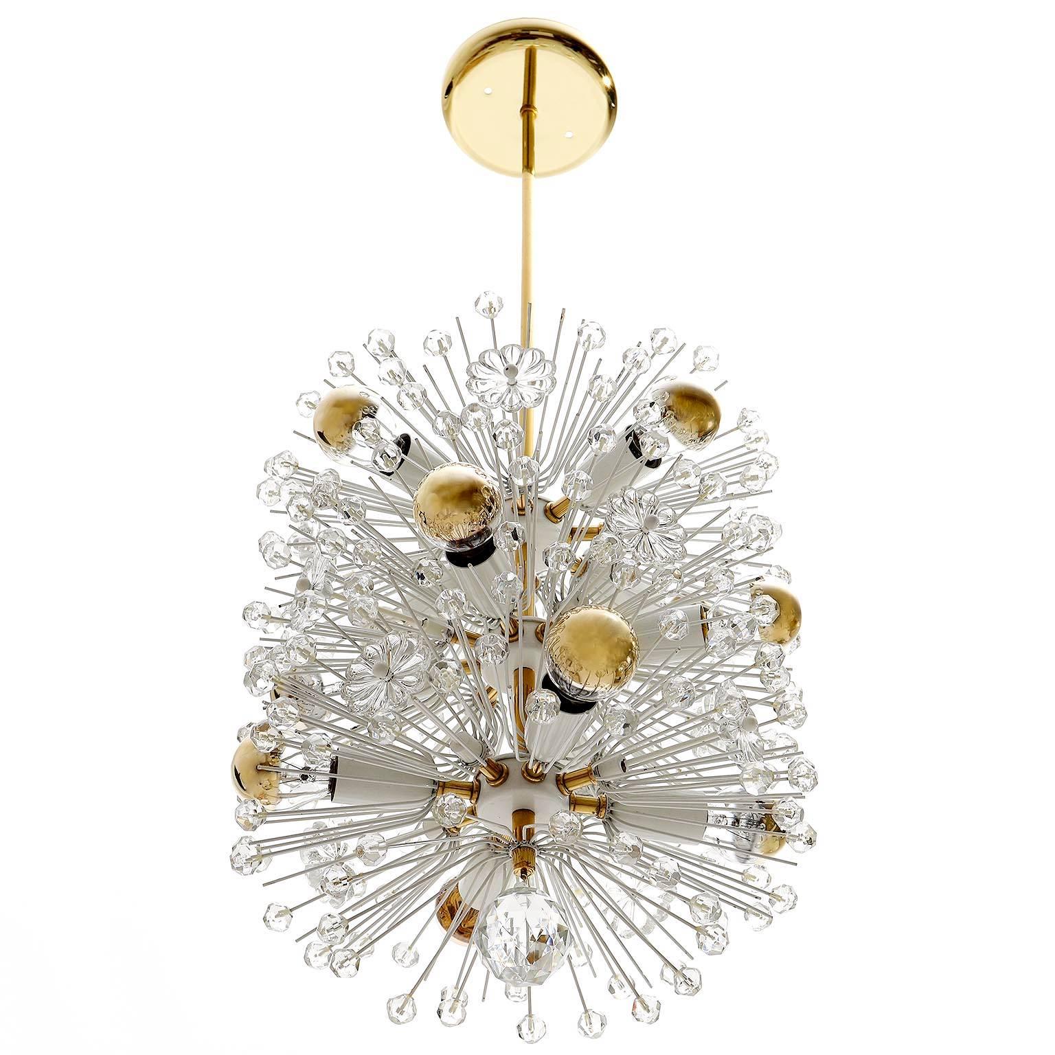 One of three outstanding Viennese sputnik / blow ball / snowball chandeliers / pendant lights by Emil Stejnar for Rupert Nikoll, Vienna, Austria, manufactured in Mid-Century, circa 1960 (late 1950s or early 1960s). 
Emil Stejnar designed this kind