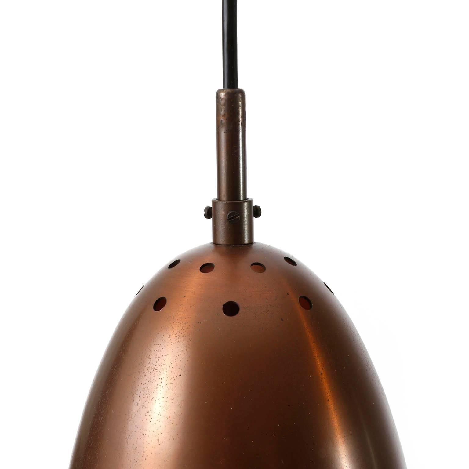 Italian Set of Three Mid-Century Modern Patinated Copper Pendant Lights, 1960 For Sale