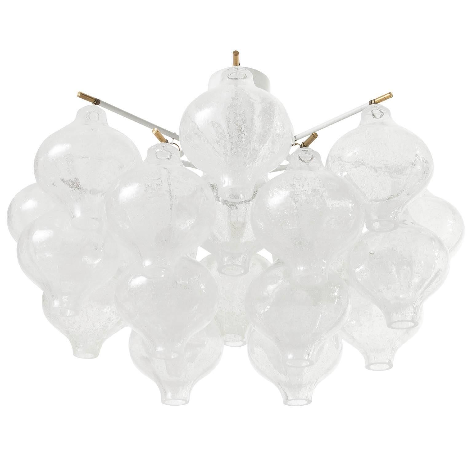 One of two beautiful 'Tulipan' flush mount lights or chandeliers by Kalmar Austria, manufactured in Mid-Century, circa 1970 (late 1960s or early 1970s). 
The name Tulipan derives from the tulip shaped hand blown bubble glasses. Each glass is