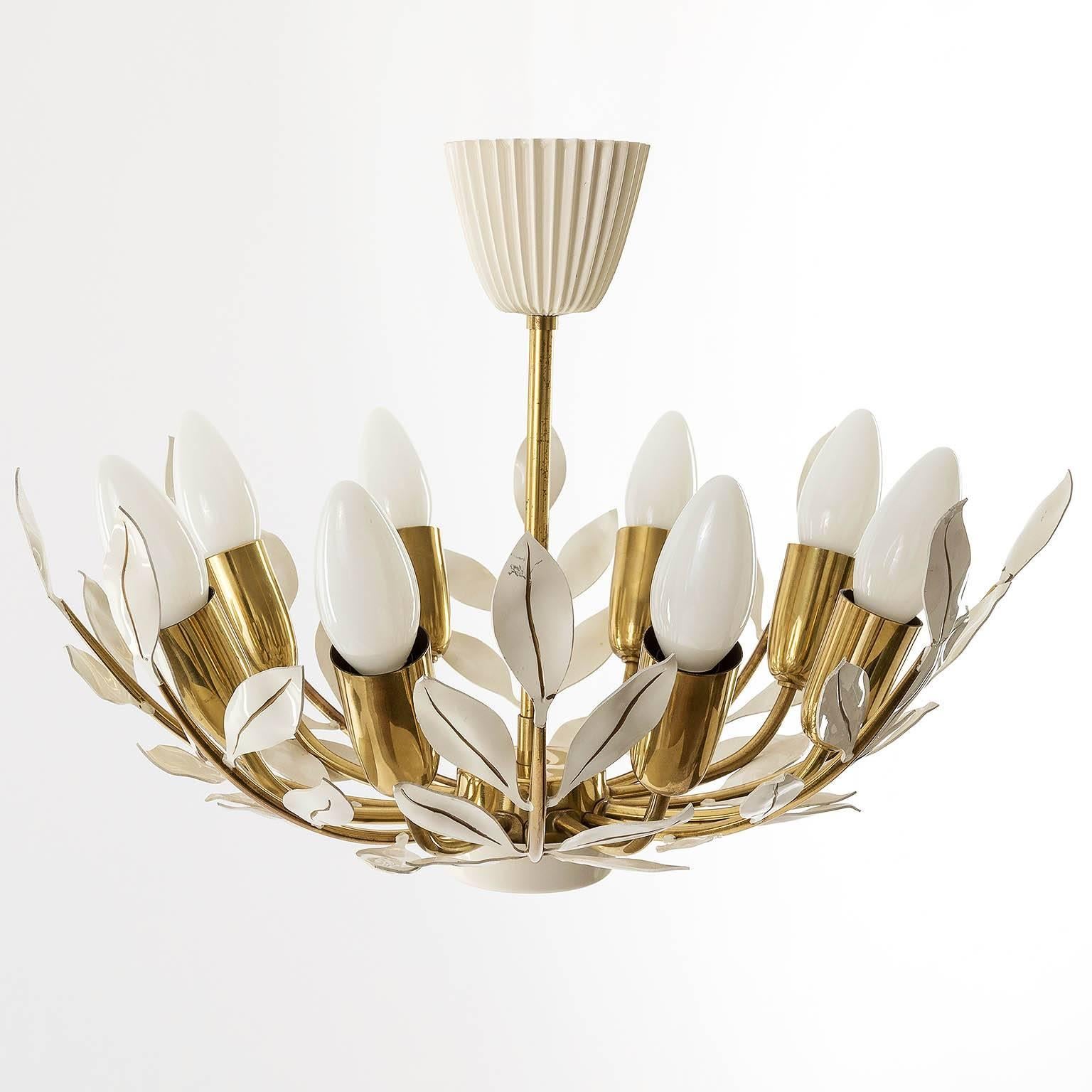 Beautiful floral chandelier or flush mount light fixture by Kalmar, Austria, 1950s. White enameled leaves on brass frame. Eight small base bulbs. Very good condition with minor loss of color on the leaves.
