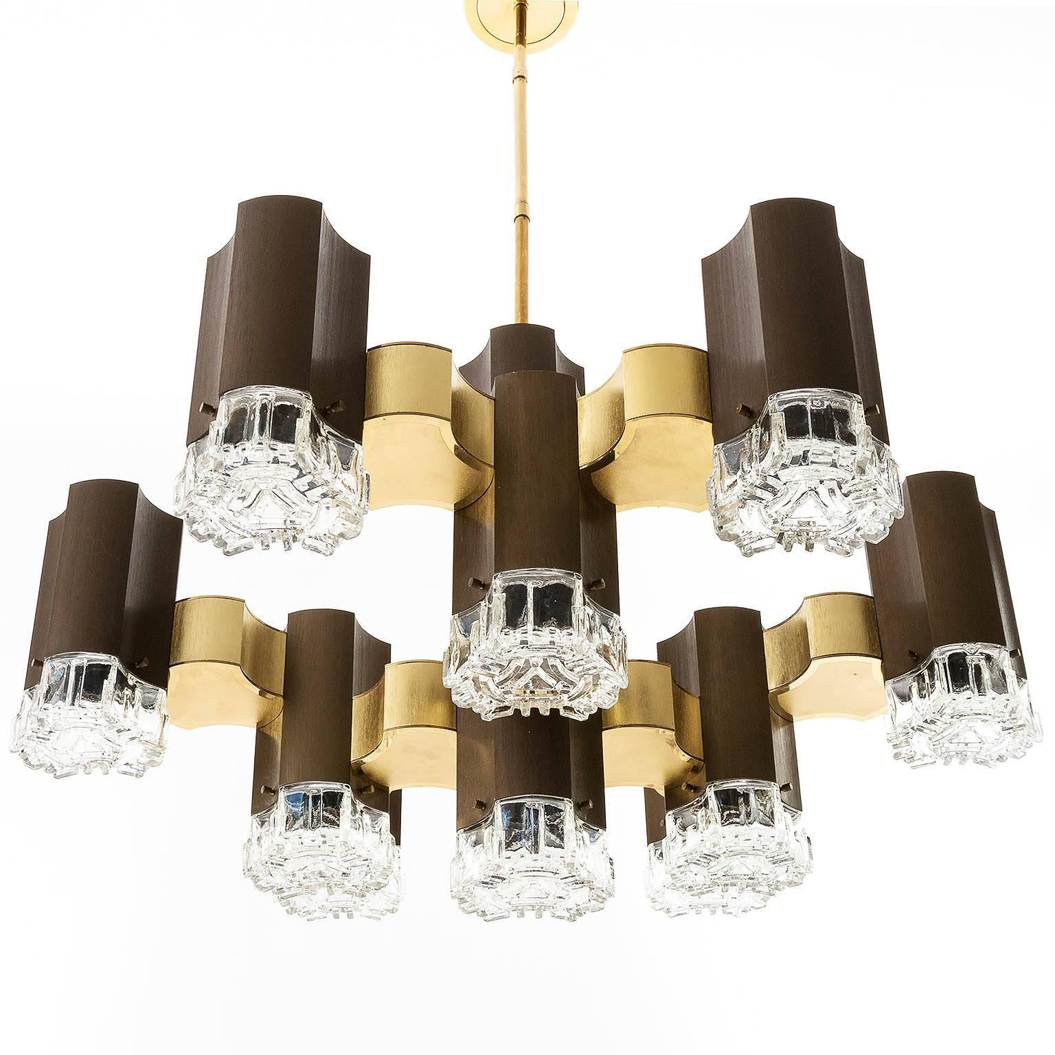 Huge and impressive bronze and gold chandelier by Gaetano Sciolari, Italy, 1970s.

Measures: Diameter 31 in (79 cm).
Height: Glass body only 19.7 in (50 cm)/including stem and canopy 43.3 inch (110 cm).
The length of the stem can be altered to