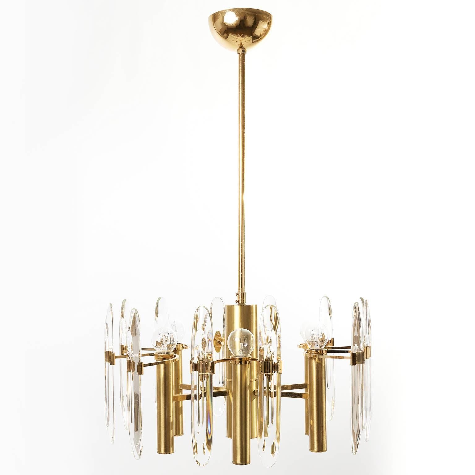 A classic Italian Sciolari chandelier with characteristic use of crystal glass and layered tiers of gilt polished and brushed brass.

Current drop: 31.5", but can be adjusted upon request.

Price is reduced from $3200.