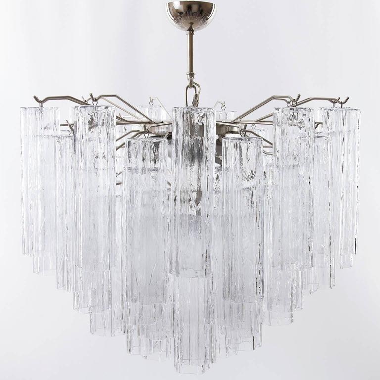 A large and wonderful Italian Venini Tronchi clear glass and chrome light fixture by Venini, manufactured in Mid-Century, circa 1960. The lamp can be used as chandelier or as semi flush mount. The lamp is labeled.

Diameter: 25.9 inch (65