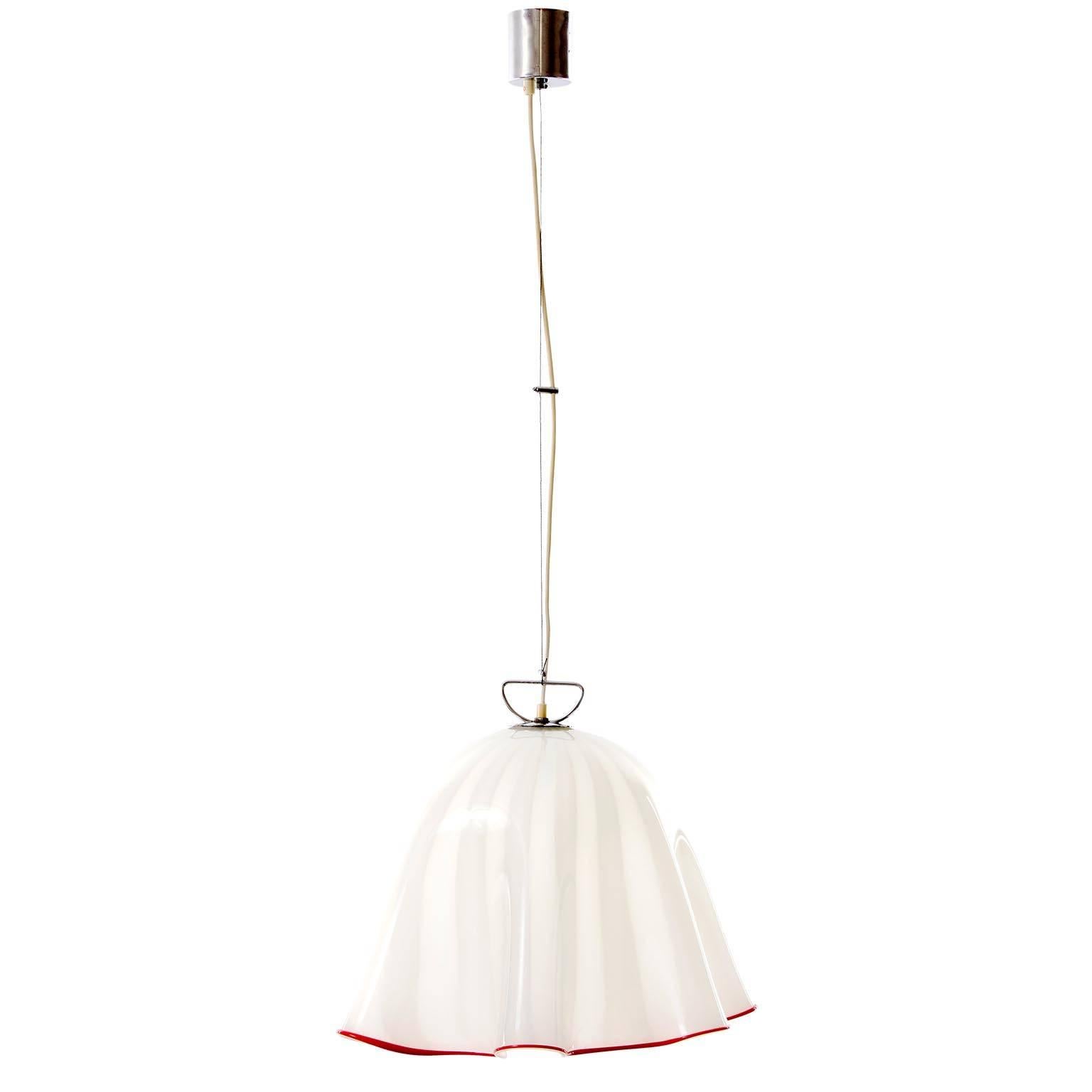 One of two beautiful handkerchief style pendant lights by Kalmar, Austria, manufactured in Mid-Century, circa 1970 (late 1960s or early 1970s). 
The lamps are in the style of  'Fazzoletto' glass objects from Fulvio Bianconi for Venini. 
They are