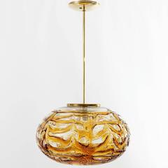 Doria Pendant Light, Textured Amber Glass Globe and Brass, 1970