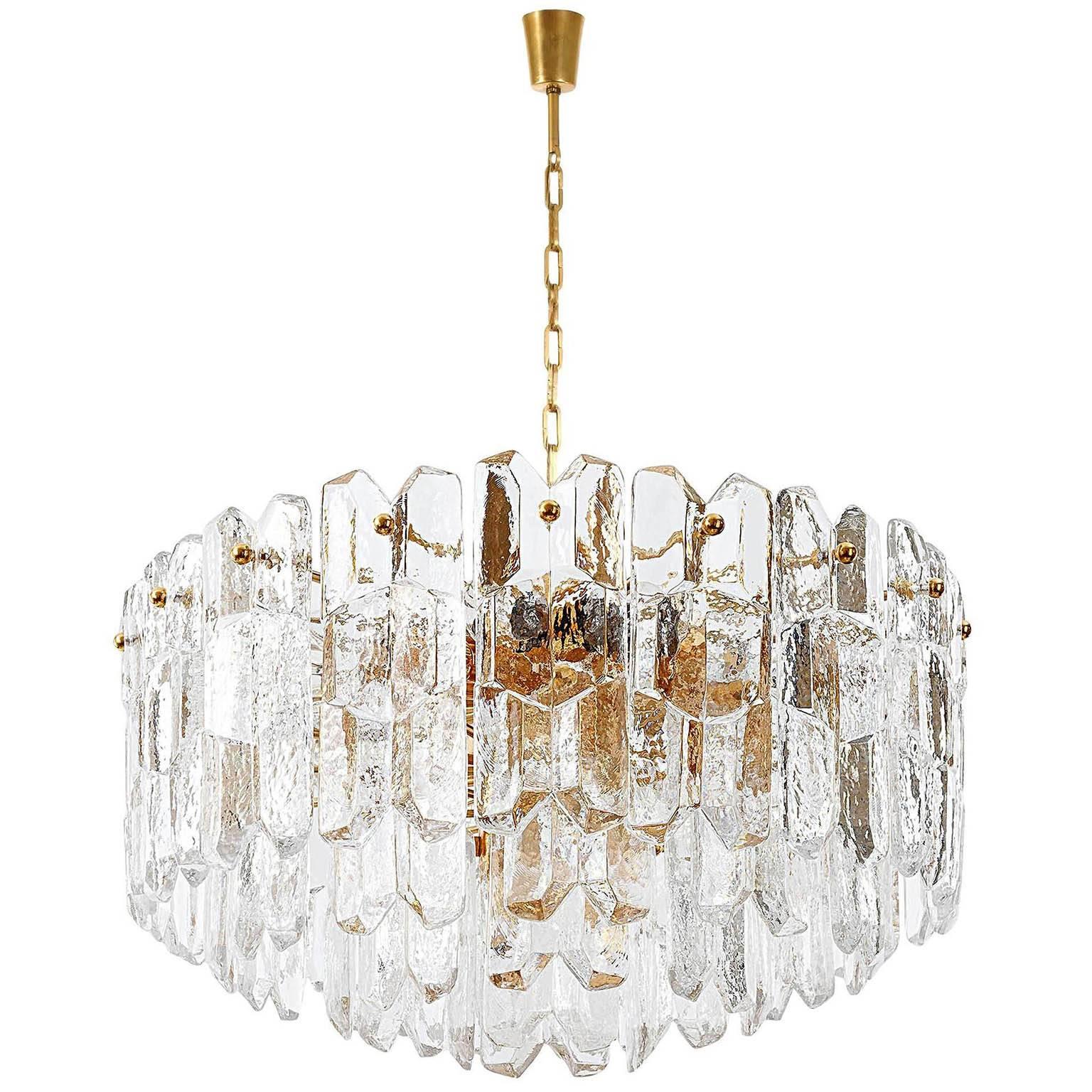 One of two very exquisit 24-carat gold-plated brass and clear brillant glass 'Palazzo' flush mount lights by J.T. Kalmar, Vienna, Austria, manufactured in circa 1970 (late 1960s and early 1970s). Labeled.
These lights are handmade and high quality