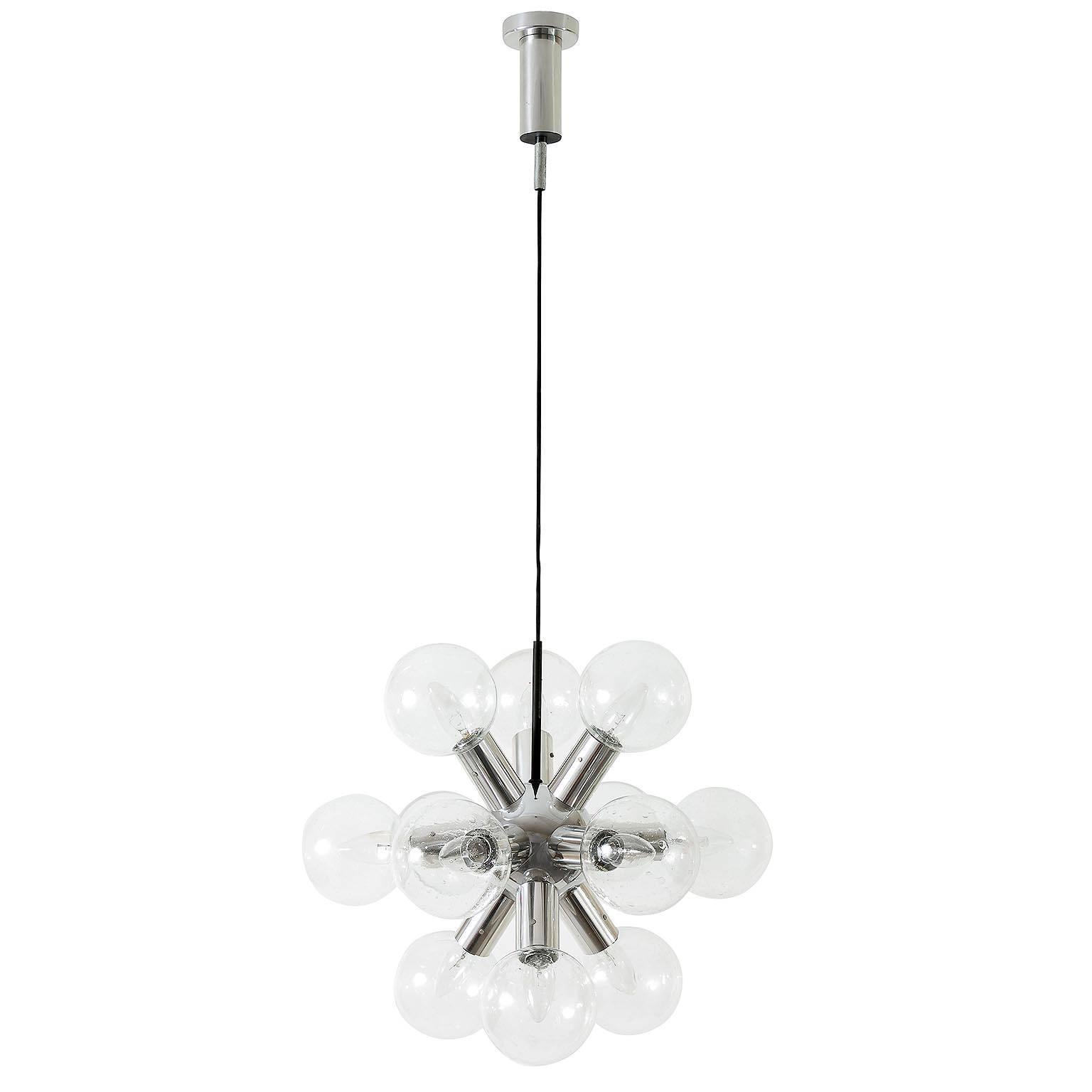 One of Two rare and fantastic 12-arm atomic chandeliers / pendant lights model 