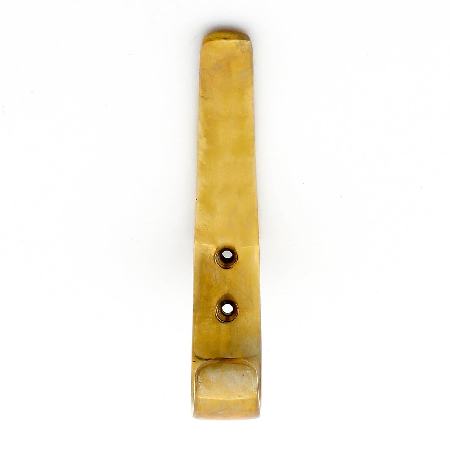 A set of five beautiful Austrian vintage coat wall hooks hooks by Hertha Baller, Vienna, 1950s. In the style of Carl Auböck. They are made of polished brass with little and lovely patina.

There are further hooks in the same style but in
