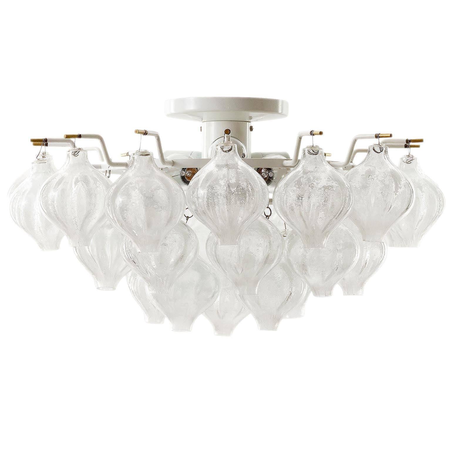 One of three large and fantastic Viennese 'Tulipan' flush mount chandeliers by J.T. Kalmar, Austria, manufactured in Mid-Century, circa 1970 (late 1960s or early 1970s.) 
The name Tulipan derives from the tulip shaped handblown bubble glasses. The