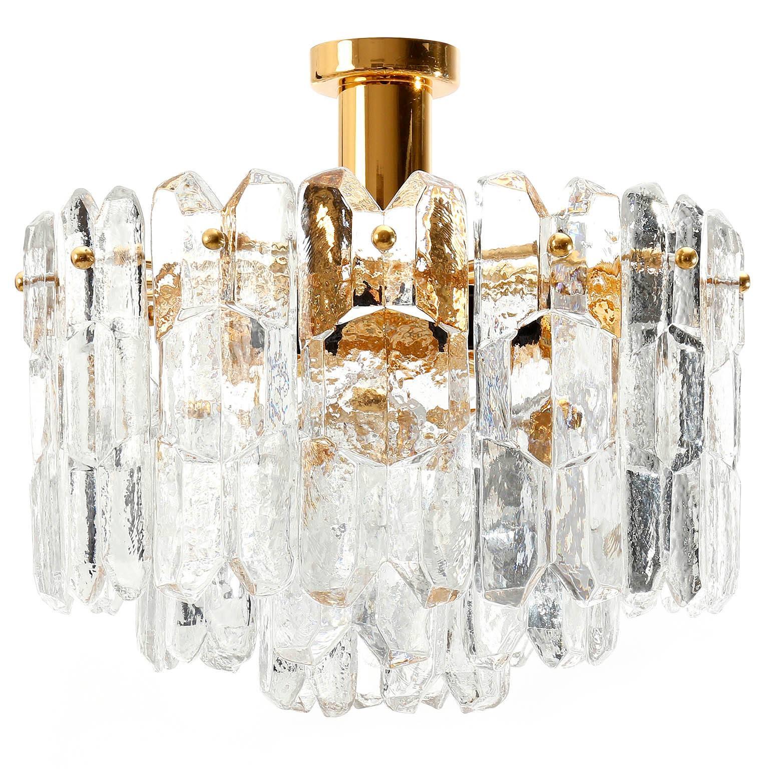 One of three exquisit 24-carat gold-plated brass and clear brillant glass 'Palazzo' flush mount lights by J.T. Kalmar, Vienna, Austria, manufactured in circa 1970 (late 1960s and early 1970s). Labeled.
These lights are handmade and high quality