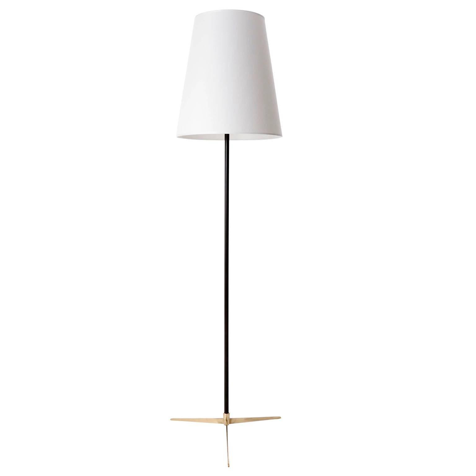 Two floor lights model 'Micheline' (model no. 2092) by J.T. Kalmar, manufactured in Mid-Century, circa 1960 (late 1950s and early 1960s).

They are made of a polished tripod brass base and a blackened metal stand. The white lamp shades have been
