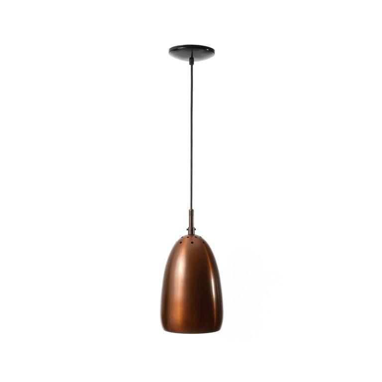 One of nine pendants with wonderful warm natural aged patina made of massive copper. 
Manufactured in Italy in Mid-Century, circa 1960 (late 1950s or early 1960s). 
The price is per light. They are sold individually, as pair, or as set of three,