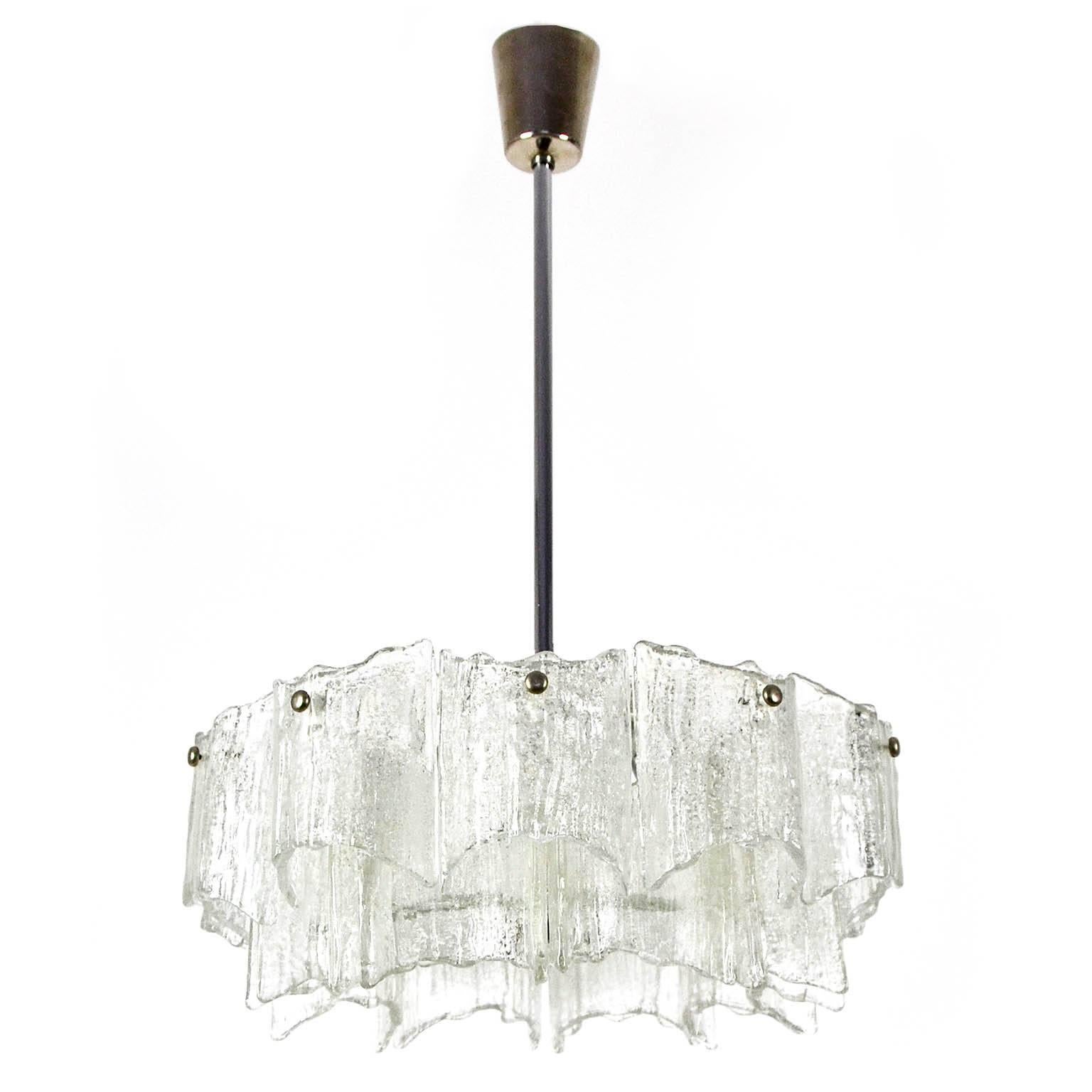 One of three beautiful star-shaped light fixtures by Kalmar, Vienna, Austria manufactured in Mid-Century, in 1960s. 
They are made of frosted ice glass and white enameled metal frames with nickeled rods and screws.
The rods can be altered to any