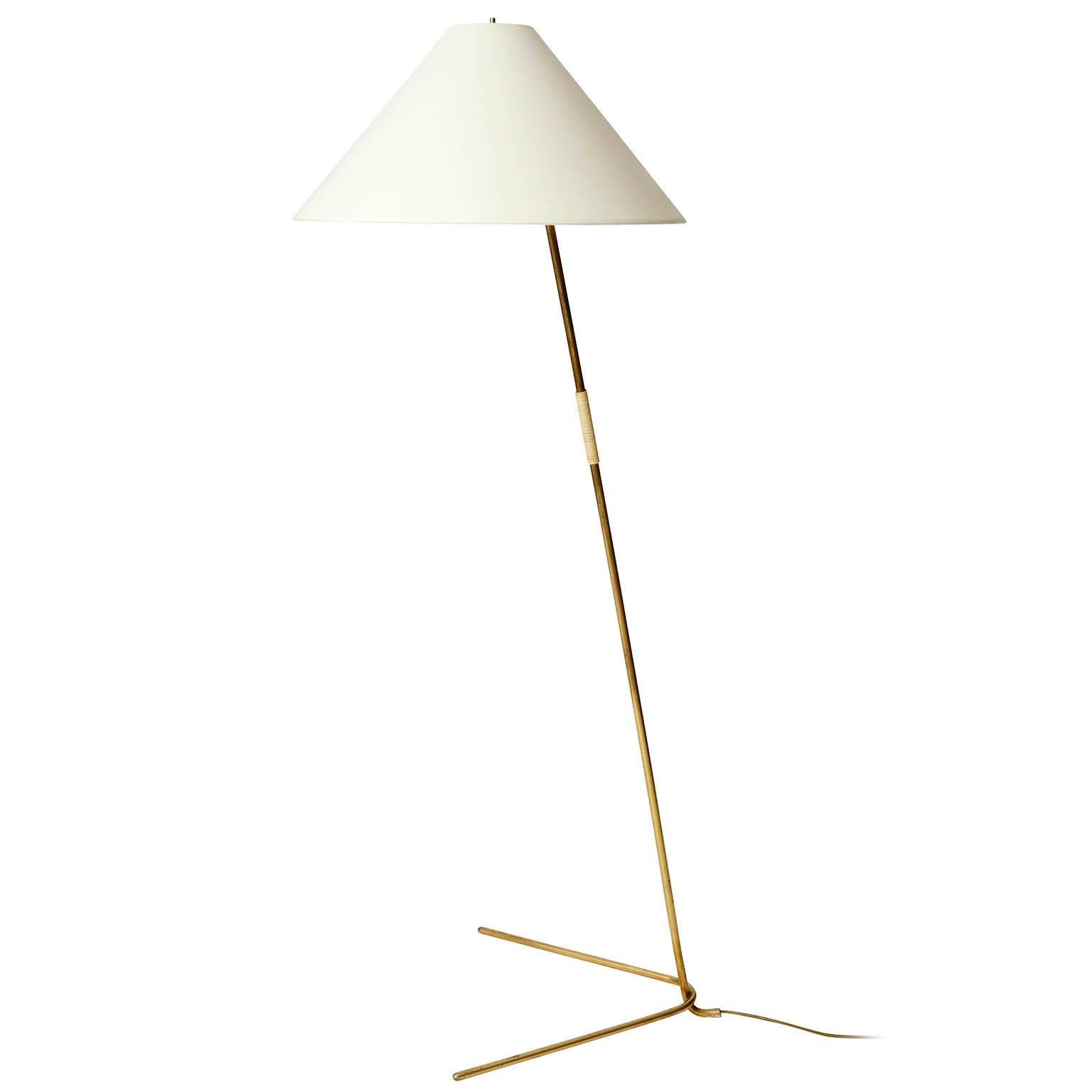 One of two beautiful brass floor lamps model 'Hase' / 'Rabbit' no.  by J.T. Kalmar, manufactured in Mid-Century, in 1950s or early 1960s. The lights are documented in the Kalmar catalogues from 1953 as well as from 1960.
The brass parts are in