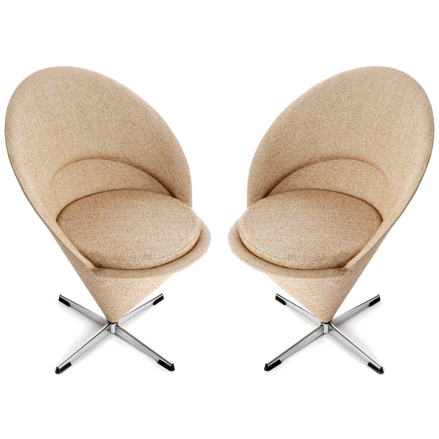 A pair of Danish modern Cone chairs designed by Verner Panton (1926 - 1998) in 1958 and manufactured in mid-century, circa 1960. The chairs are in very good original condition with an original brown and beige wool upholstery.

About Verner