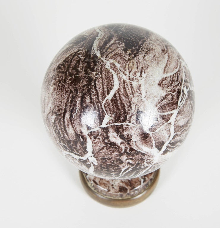 Rare antique french faux marble Newell ball. The sculpture is set on a wooden bottom.