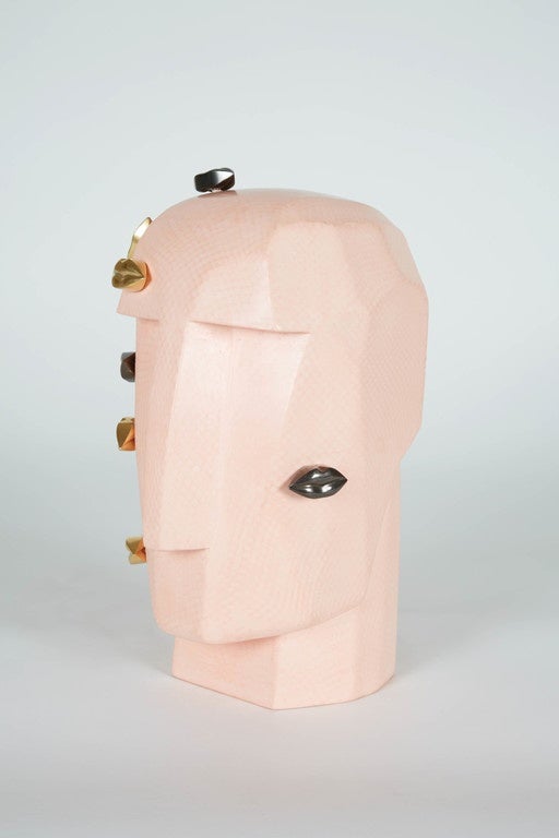 Hand crafted in Los Angeles, this Super Luxe Head Trip Sculpture is one–of–a–kind and signed by Kelly Wearstler. Lola features hand craved lips on a hand–troweled plaster. She comes with an elegant leather and fur-trimmed pouch.