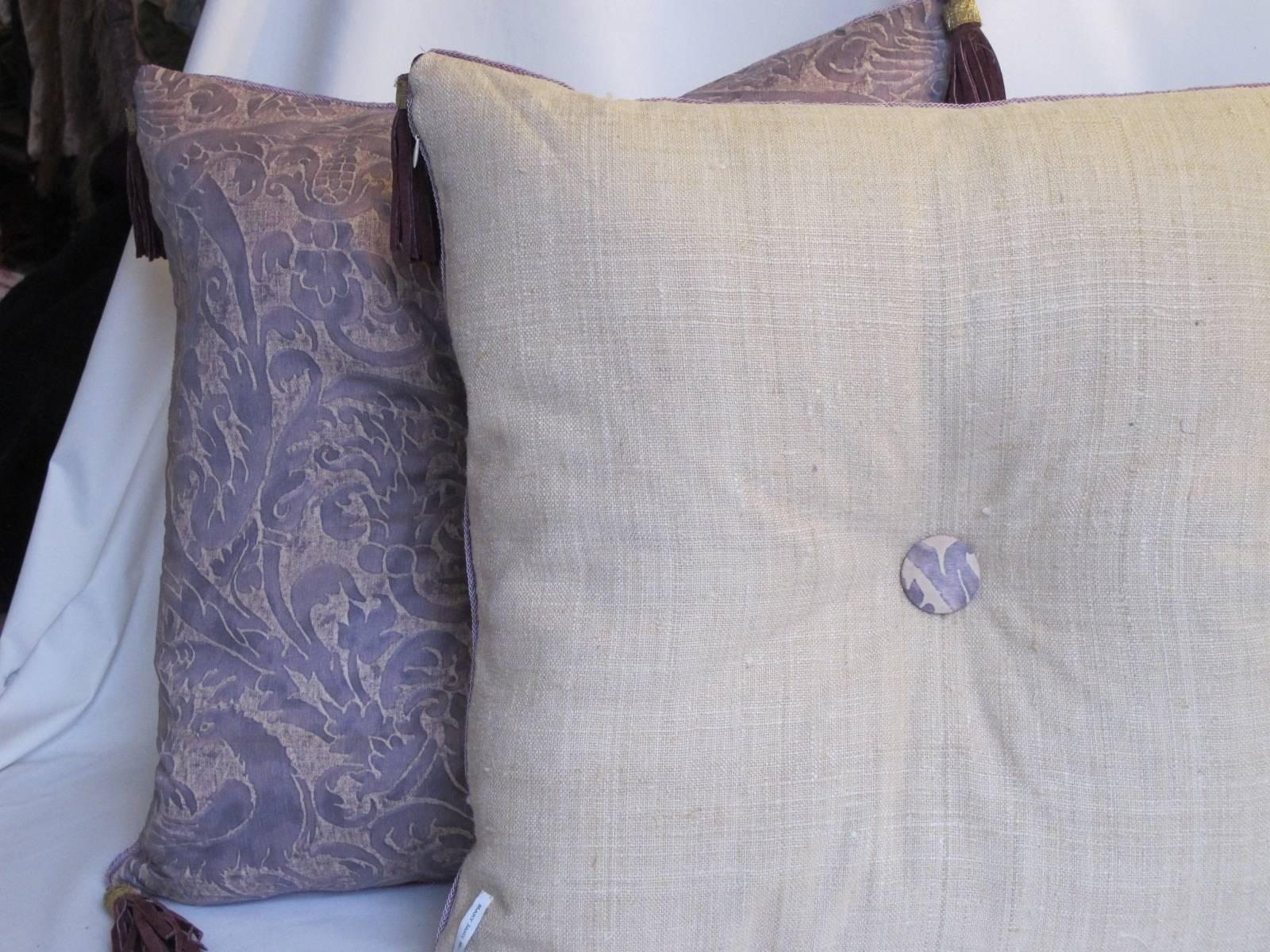 Newly made pillows from a Midcentury authentic Fortuny fabric. they are backed with a natural raw silk and are embelished with handmade leather tassels.