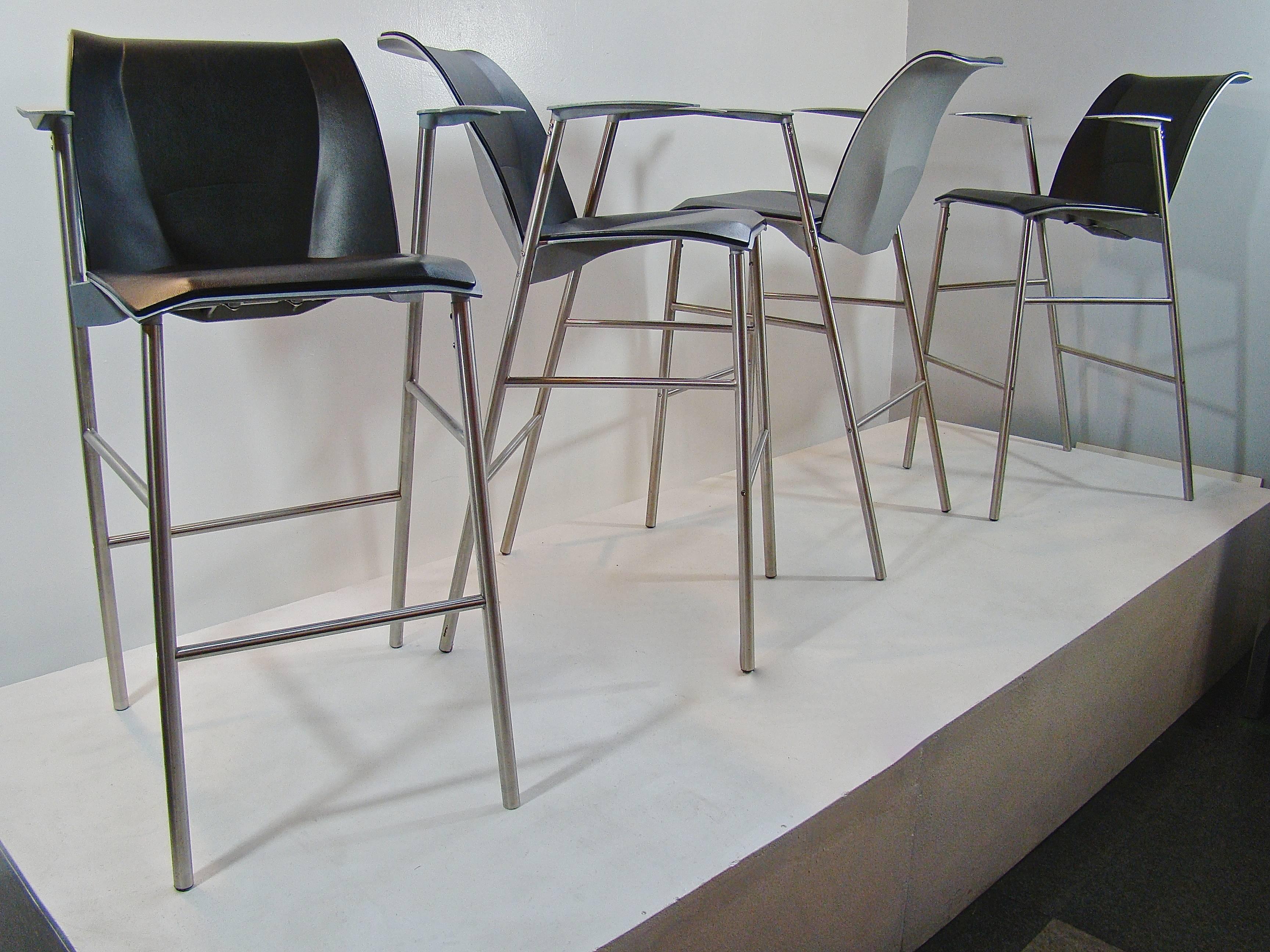 Extremely rare Frank Gehry Fog bar stools produced by Knoll Studio in a very limited number in 1999. Comprised of high quality polished anodized cast aluminum, these bar stools are not only beautiful, but extremely comfortable as well as they