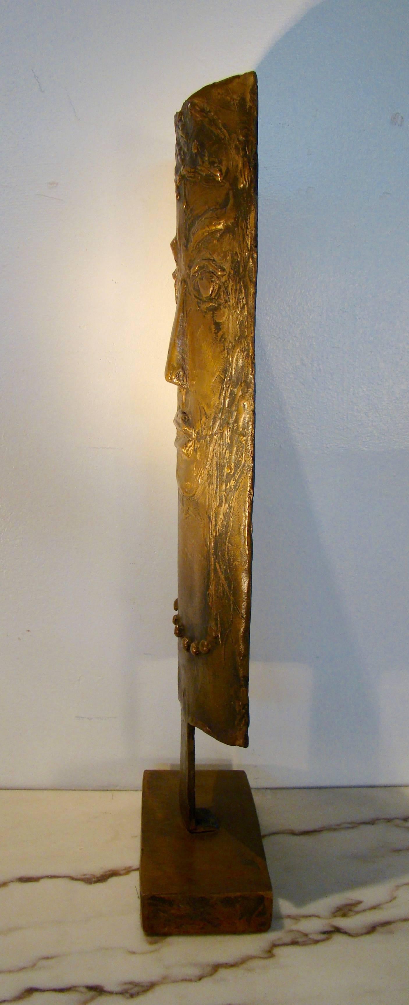 Flat plate bronze torch-cut, forged and figured bust on a bronze stand.
Signed: E. Katz, circa 1965. Measures: 