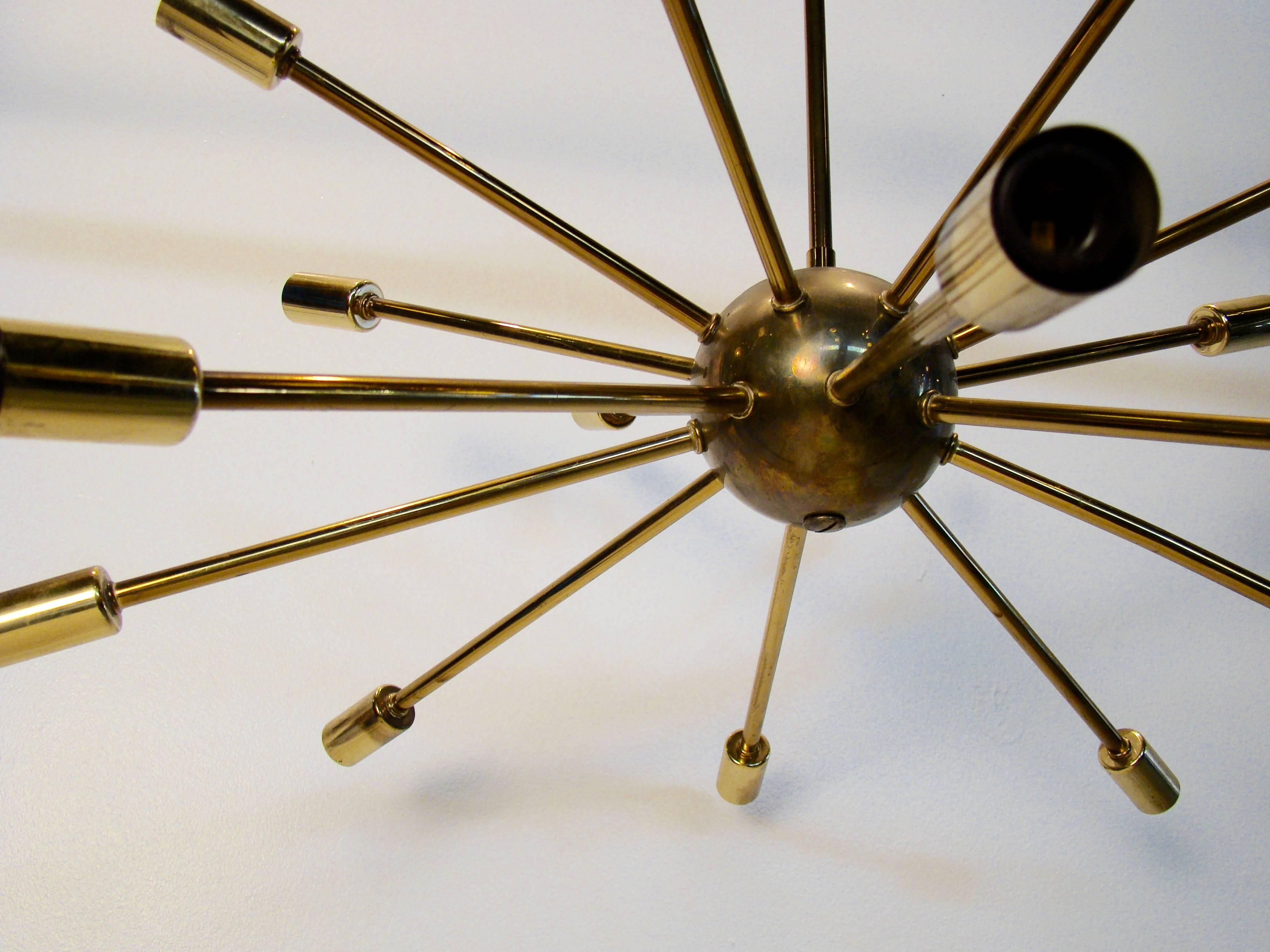 Beautiful brass Sputnik pendant chandelier.

Measures: 24
