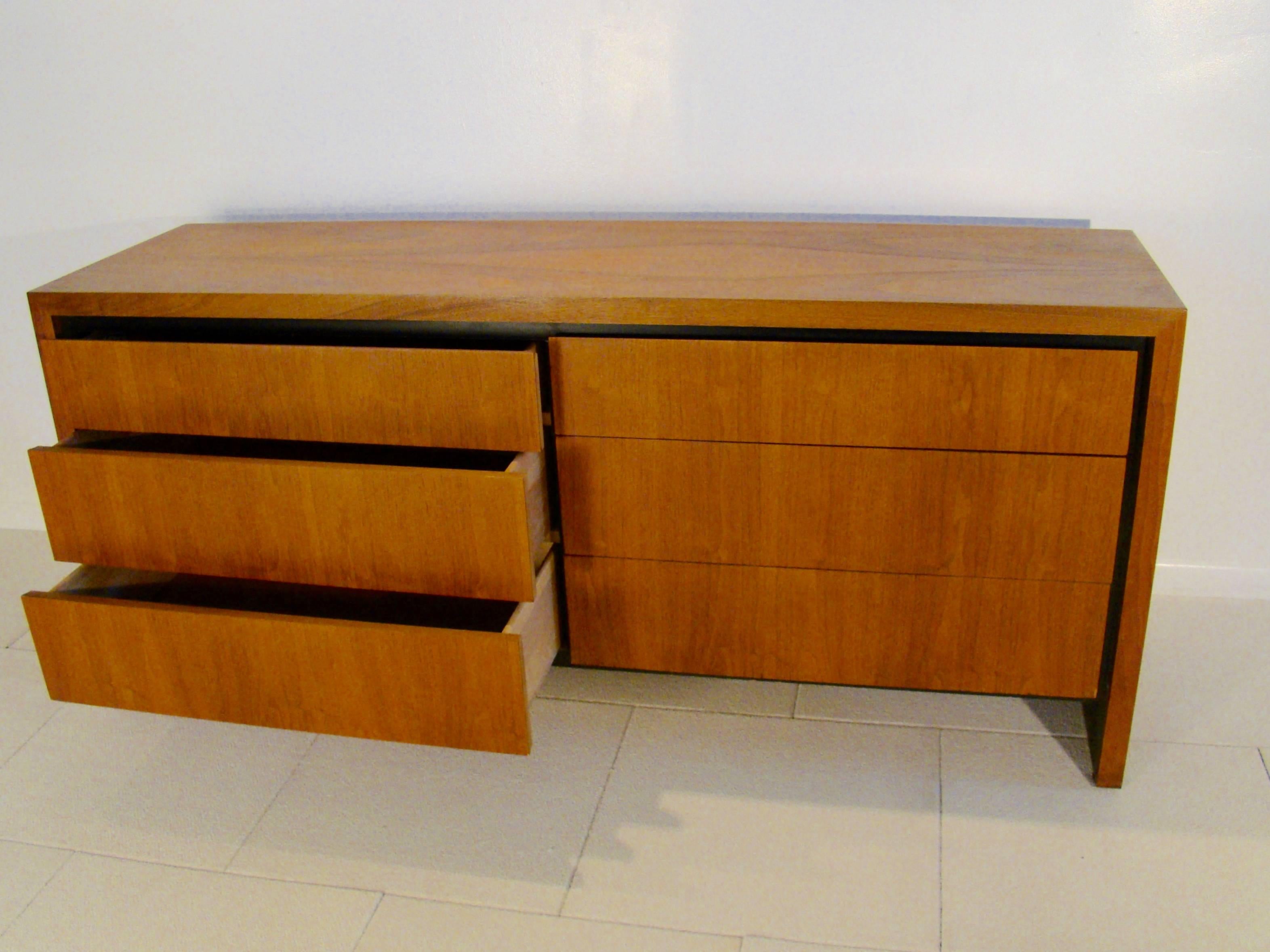 Beautiful walnut and black six-drawer dresser or credenza attributed to Milo Baughman for Dillingham, circa 1970s.