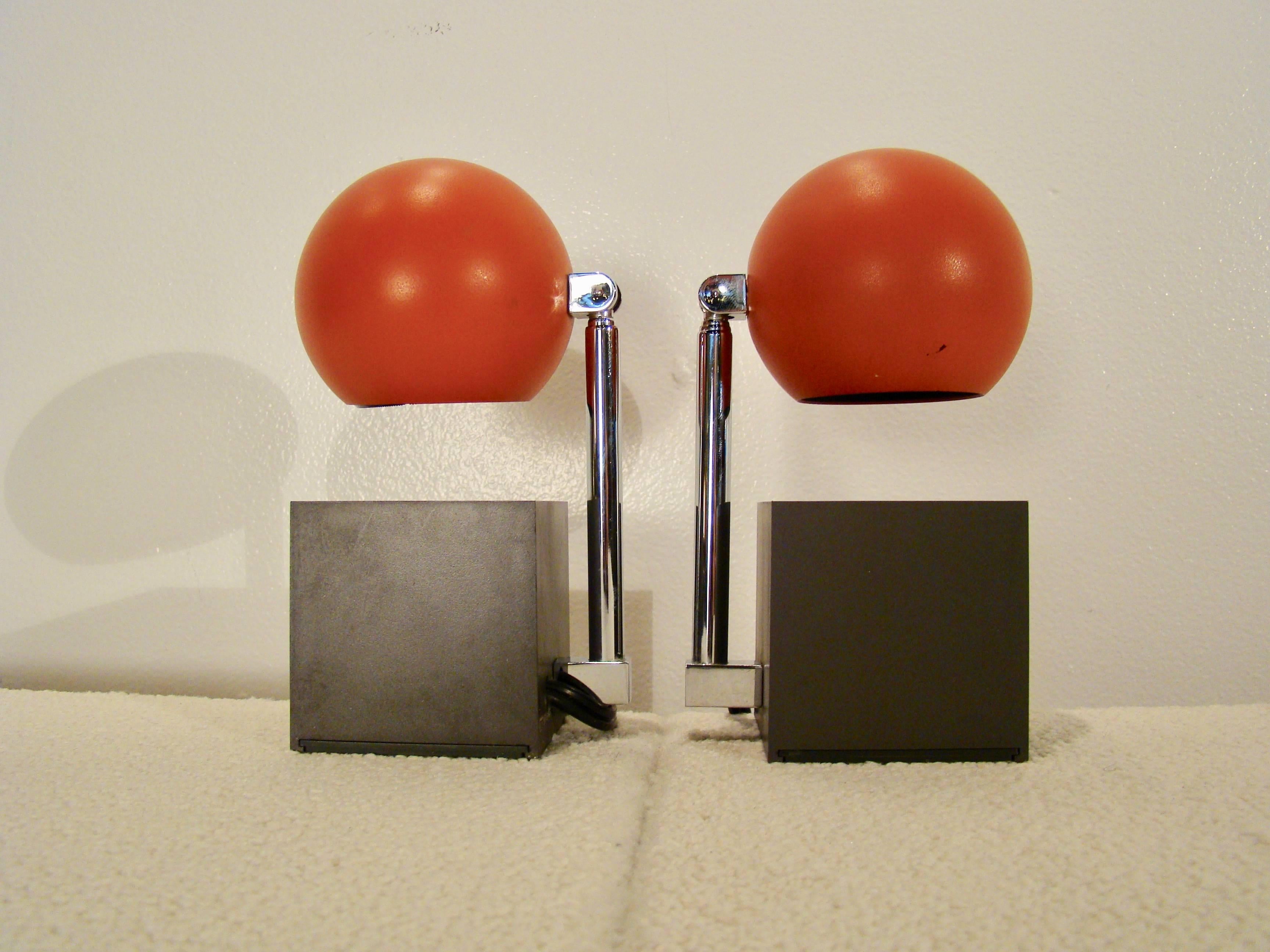 Pair of telescopic eyeball task lamps by Michael Lax for Lightolier in original boxes. Chrome base with a spherical light on a telescoping arm which adjusts from 6.5"-15".