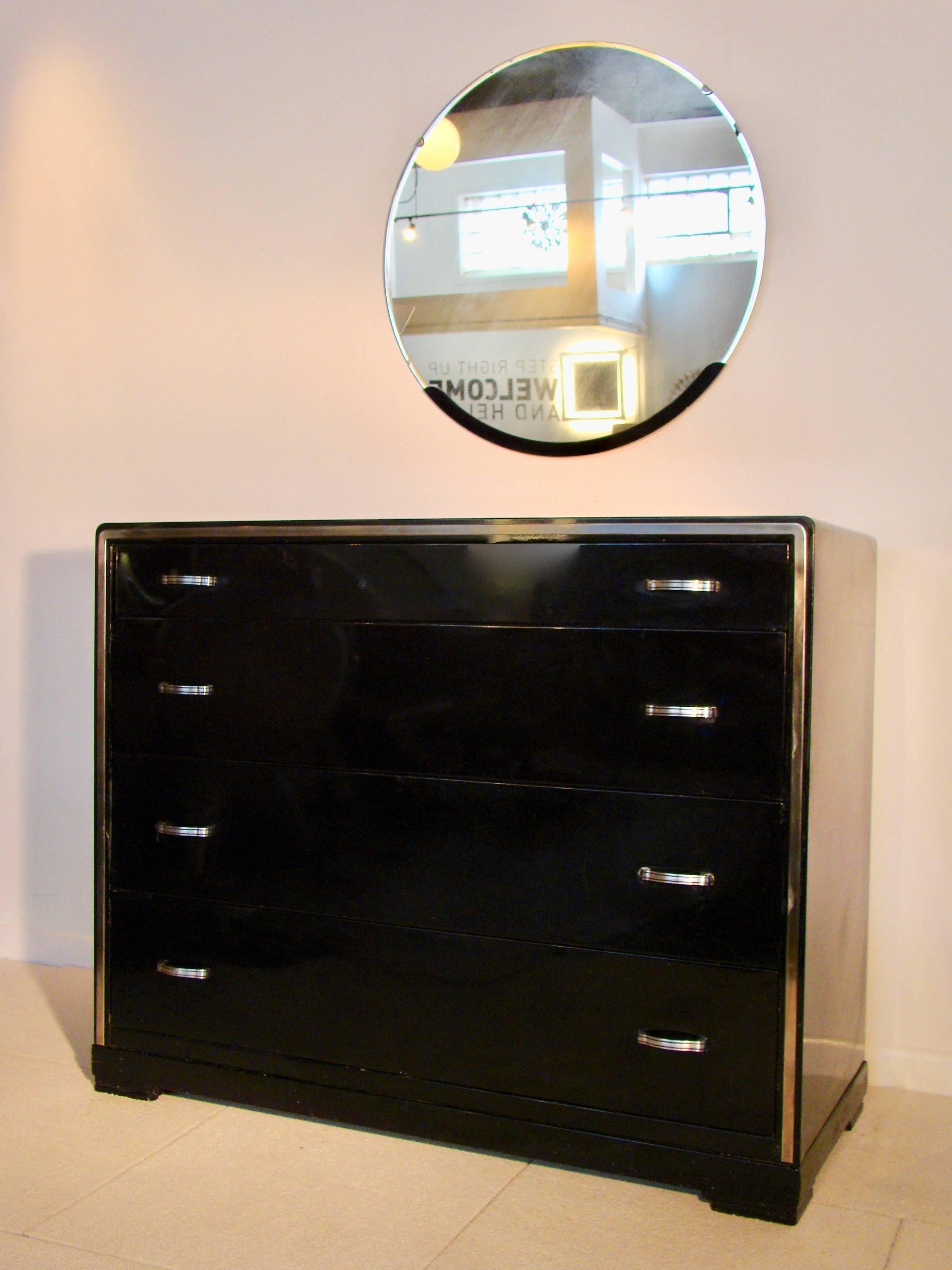 Beautiful Art Deco mirror designed by Norman Bel Geddes for Simmons, circa 1930s. Dresser is in a separate listing.